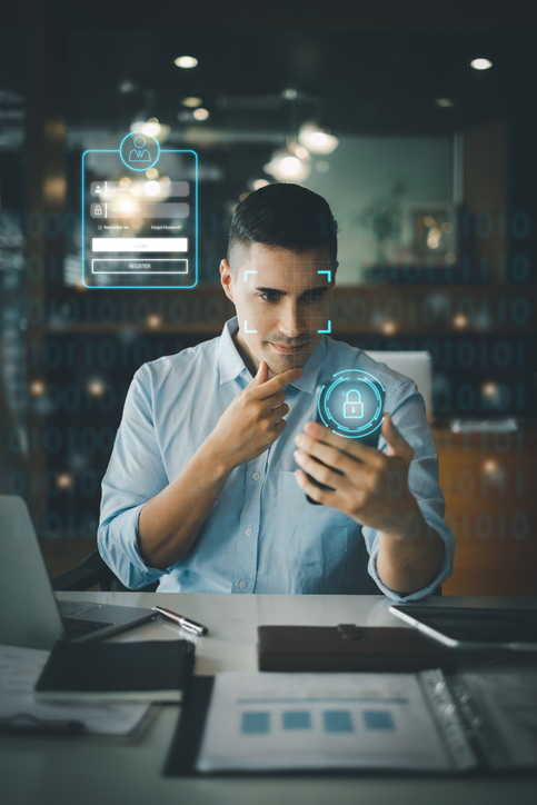 cyber security photo of a man looking at phone